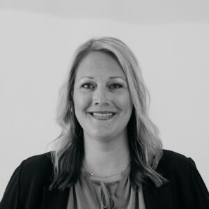 Black & white headshot of Valerie Corniel on Harvest Group Costco team