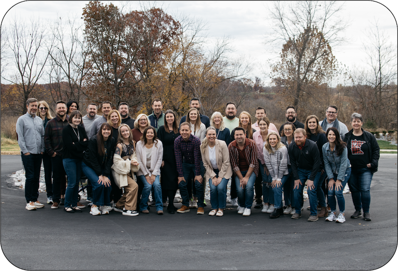 Harvest Group's Target Team in a group photo outside at a company event