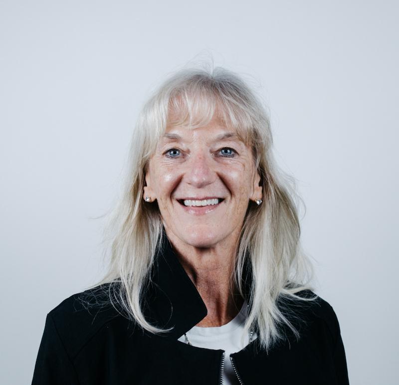 woman smiling wearing black jacket