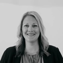 Black & white headshot of Valerie Corniel on Harvest Group Costco team